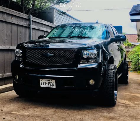 2009 Chevrolet Avalanche with 24x12 -44 TIS 544BM and 33/12.5R24 Radar ...