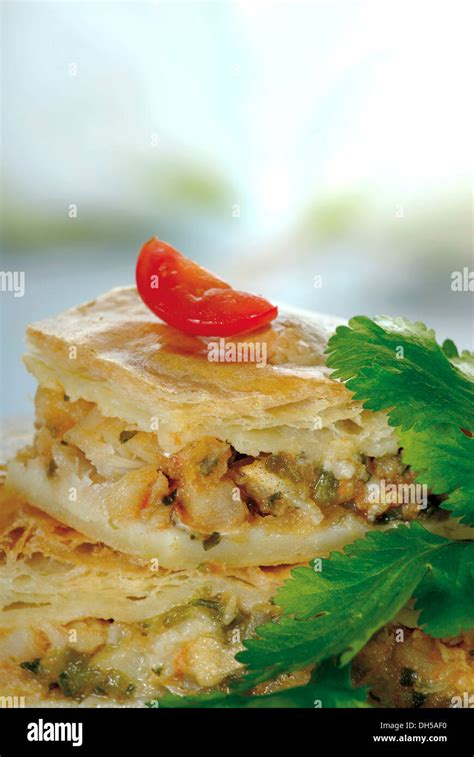 Stuffed puff pastry with stockfish Stock Photo - Alamy
