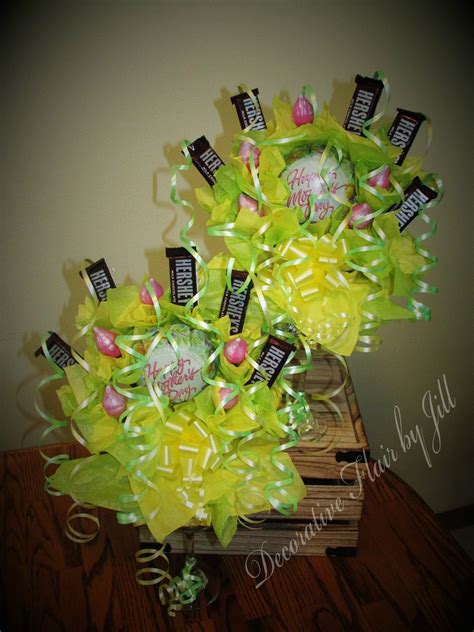 2 custom ordered Mother's Day candy bouquets displayed from wine glasses with chocolate candy ...