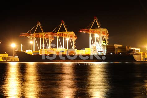 Cargo Container Ship At Night Stock Photo | Royalty-Free | FreeImages