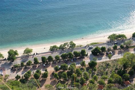 Blue Ocean of Cristo Rei Beach in Dili, Timor Leste - Adam Constanza