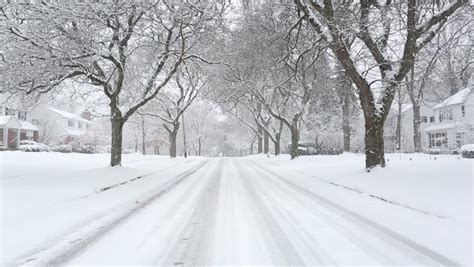 Storm Snow Blizzard Small Rural Town With Cars Drive Through Heavy Snow ...