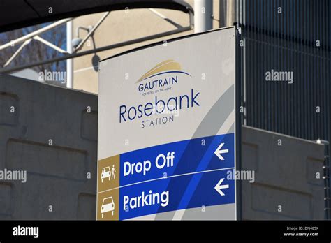 Directions at the entrance of the Rosebank Gautrain station Stock Photo ...