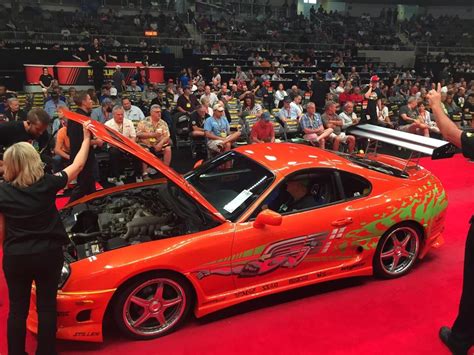 Paul Walker’s Fast and Furious Orange Toyota Supra sells for $185000 at ...