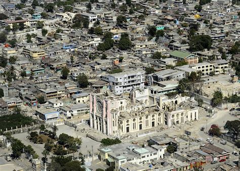 File:US Navy 100128-N-5345W-148 The Roman Catholic cathedral, in the foreground, and the Haiti ...