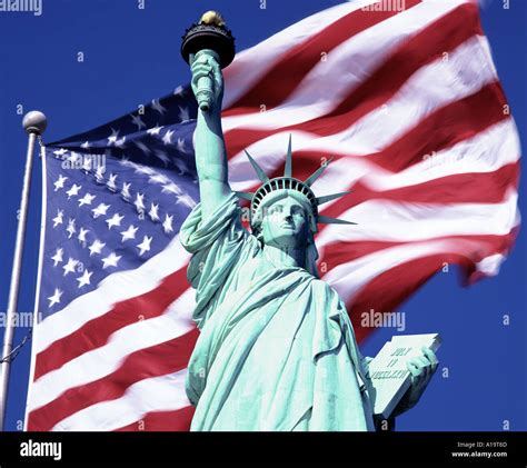 USA New York The Statue of Liberty and US Flag Stock Photo: 3327084 - Alamy