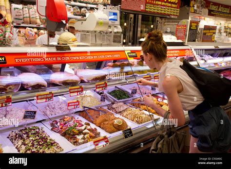 A shopper in the deli department in the Fairway supermarket on the Upper East Side of New York ...