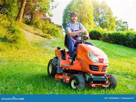 Gardener Driving Riding Lawn Mower In Garden Royalty-Free Stock ...