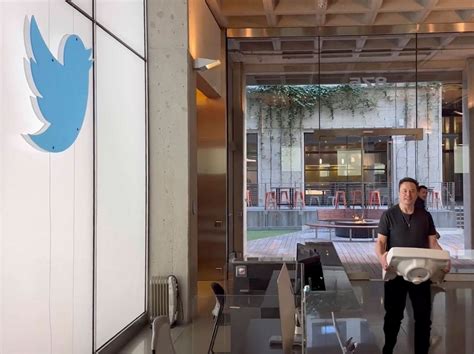 Musk posts video of himself strolling into Twitter HQ