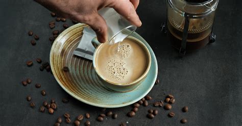 Pouring Milk to Coffee · Free Stock Photo