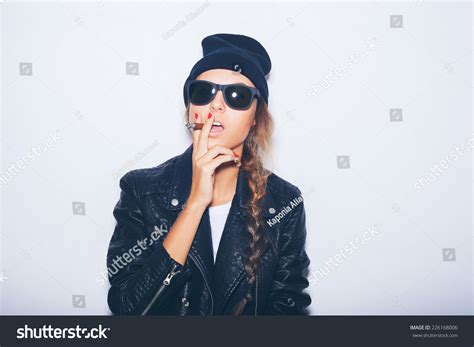 Sexy Girl In Sunglasses And Black Leather Jacket Smoking Cigar. White Background, Not Isolated ...