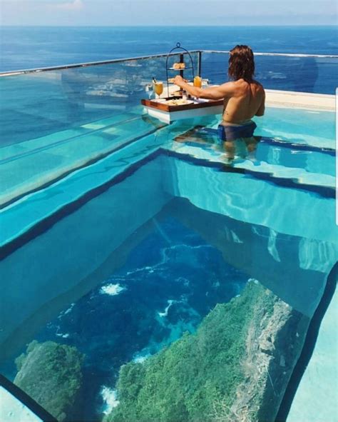 The glass-bottomed pool peers over the edge of a 500ft cliff drop | Pool, Beautiful places in ...