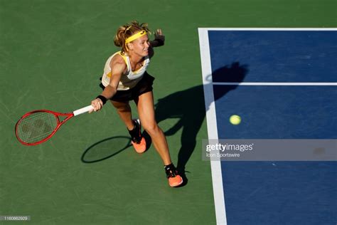 Marie Bouzkova returns the ball during her semi-finals match of the ...