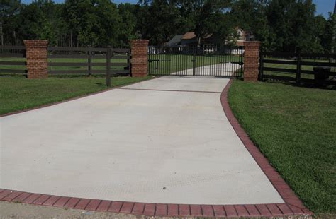 Plain Concrete Driveway with Brick Borders | Driveway design, Concrete driveways, Brick border