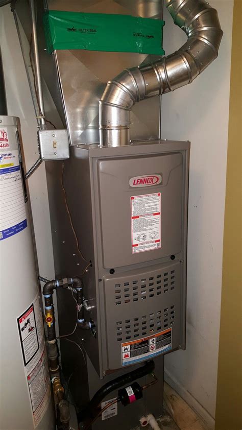 Lennox ML180 downflow natural gas furnace installed by Compass Heating and Air Conditioning, Inc ...