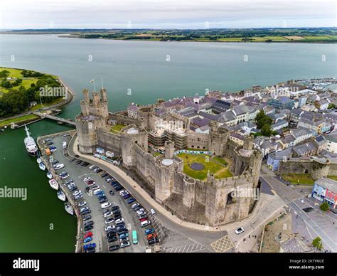 Aerial view of the ancient Caernarfon Castle in North Wales Stock Photo ...