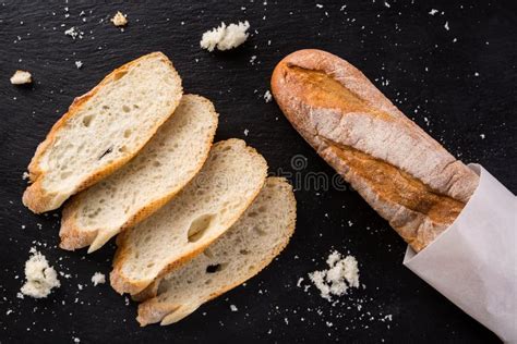 French Homemade Baguette Bread. Wheat Baguette on Black Shale Stock Photo - Image of loaf ...