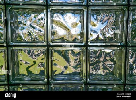 Abstract patterns in a wall of glass blocks Stock Photo - Alamy