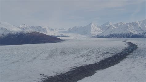 4K stock footage aerial video flying over Knik Glacier, tilt down, Knik ...