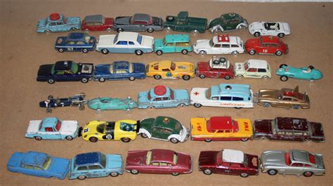 A collection of Corgi Toys cars, including a No. 158 Lotus Climax F1, boxed, with packing piece and
