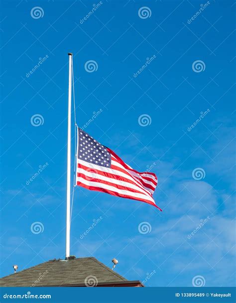 American Flag Flying at Half Staff Stock Image - Image of states, blue ...