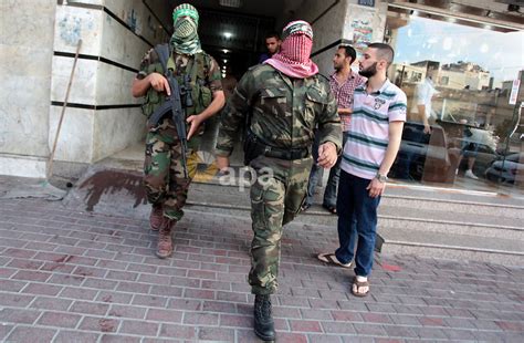 Spokesman of al-Qassam Brigade, the military wing of Hamas movement, Abu Obeida, leave after ...
