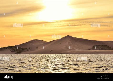 Sunset over Silver Lake Sand Dunes Stock Photo - Alamy