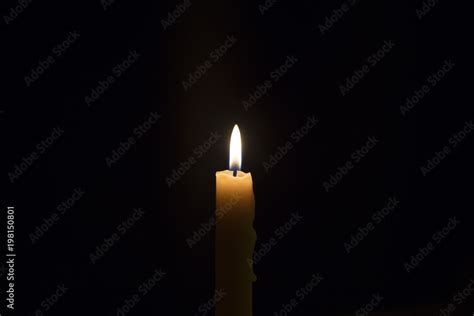 Candle flame closeup isolated on black. Abstract Background. Stock ...