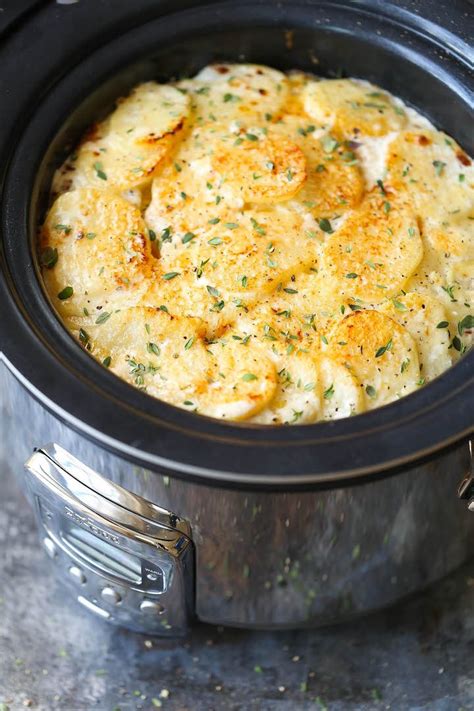 Slow Cooker Cheesy Scalloped Potatoes Recipe| Damn Delicious