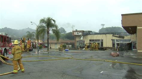 Fire rips through Highland Park strip mall, causes partial roof ...