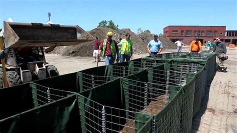 Demonstrating HESCO flood-control barriers in Cedar Rapids - YouTube