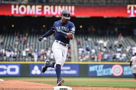 Julio Rodríguez hits 12th HR as Mariners topple Orioles 9-3 | AP News