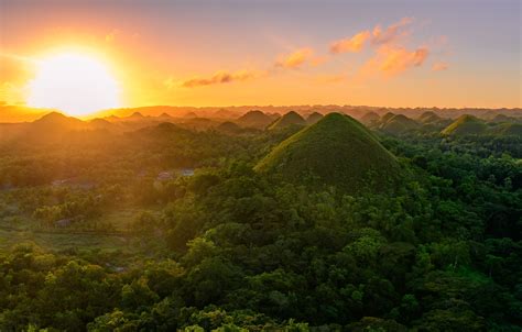 Sunrise over the Chocolate Hills in the Philippines. | Behance :: Behance