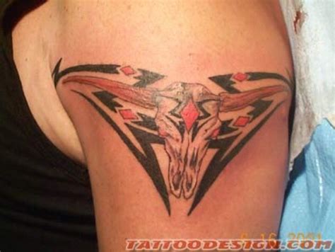 Tribal bull skull tattoo | Bull skull tattoos, Tattoos, Country tattoos