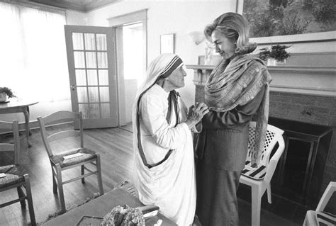 Mother Teresa Helping The Poor