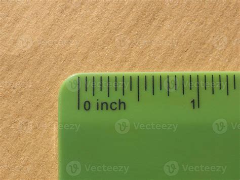 green plastic imperial ruler 5764590 Stock Photo at Vecteezy