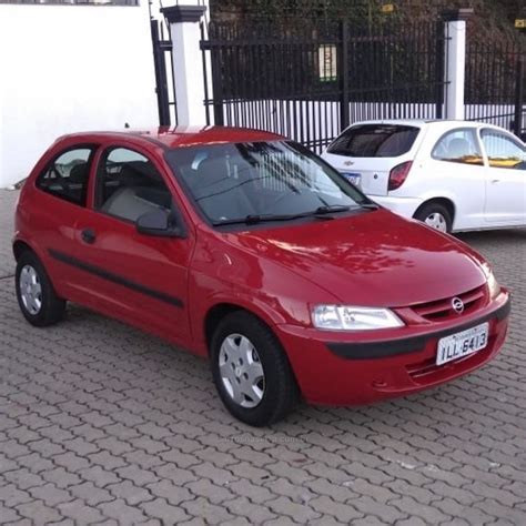 CHEVROLET - CELTA - 2003/2004 - Vermelho - R$ 12.800,00 - RD - Multimarcas