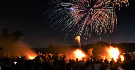 In Photos: Giant 'torches,' fireworks light up night sky on shore of ...