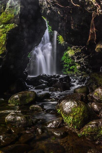 Premium Photo | Waterfall in cave