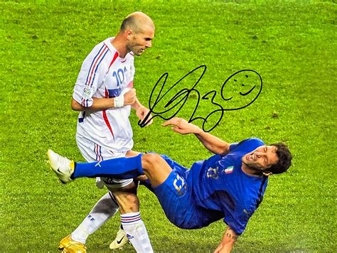 Marco Materazzi Signed “Zidane Headbutt” Photo – National Football Museum Shop