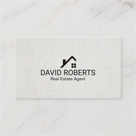 a real estate agent business card with the logo for david roberts's real estate agent