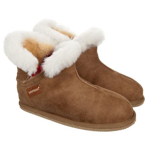 The slippers for women by Bela Shepherd in sheepskin and non-slip soles