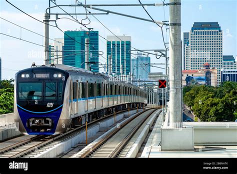 A Metro Train Travelling On The Jakarta Metro (MRT), Jakarta, Indonesia ...