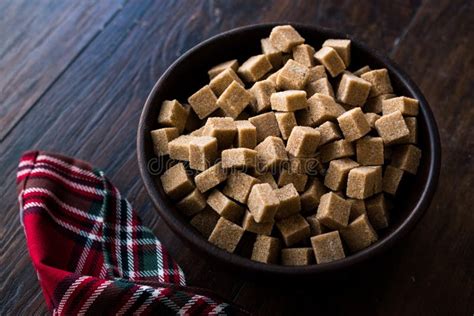 Raw Organic Brown Sugar Cubes in Wooden Bowl Ready To Eat Stock Image ...