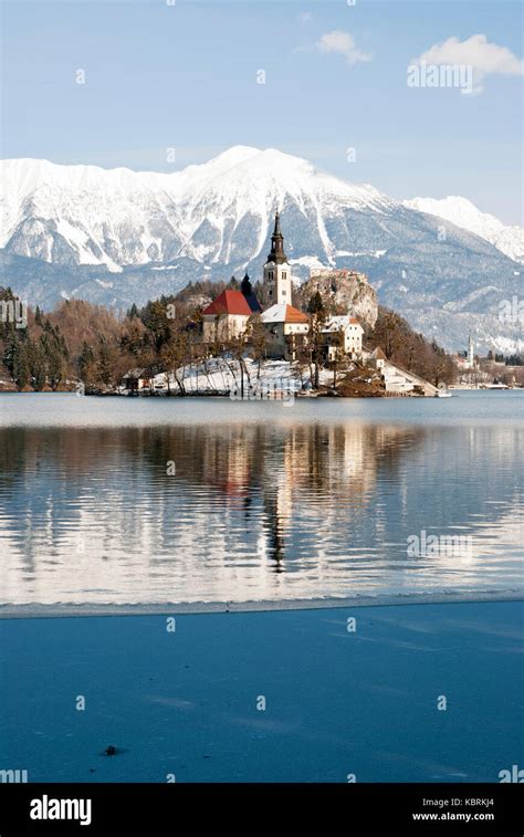 Lake Bled with castle behind in winter, Bled, Slovenia Stock Photo - Alamy