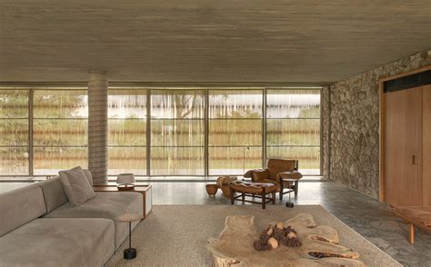 Casa do Lago brings brutality and softness in concrete to a lakeshore ...