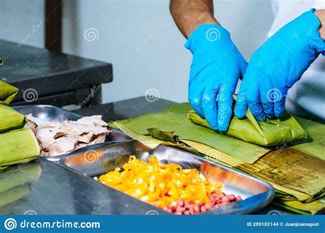 Peruvian Recipe for Preparing Tamales with Banana Leaves and Cornmeal ...