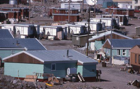 III.5: INUIT CLOTHING/SHELTER 5. Houses in Town ~ People of the Arctic by John Tyman