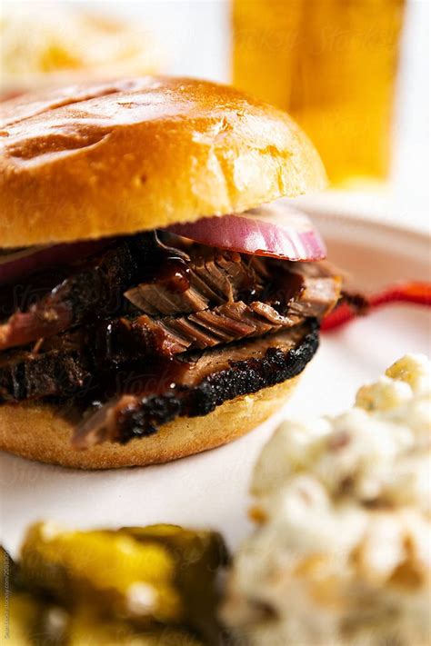 "Smoked: Hearty Beef Brisket Sandwich With All The Sides" by Stocksy ...