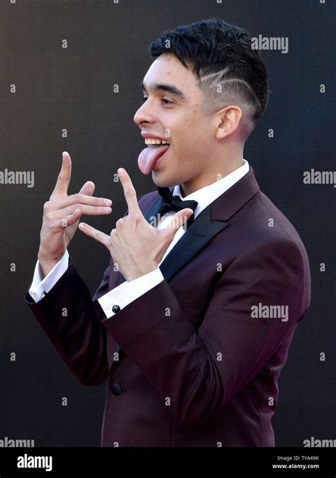 MC Davo arrives on the red carpet for the 19th annual Latin Grammy ...